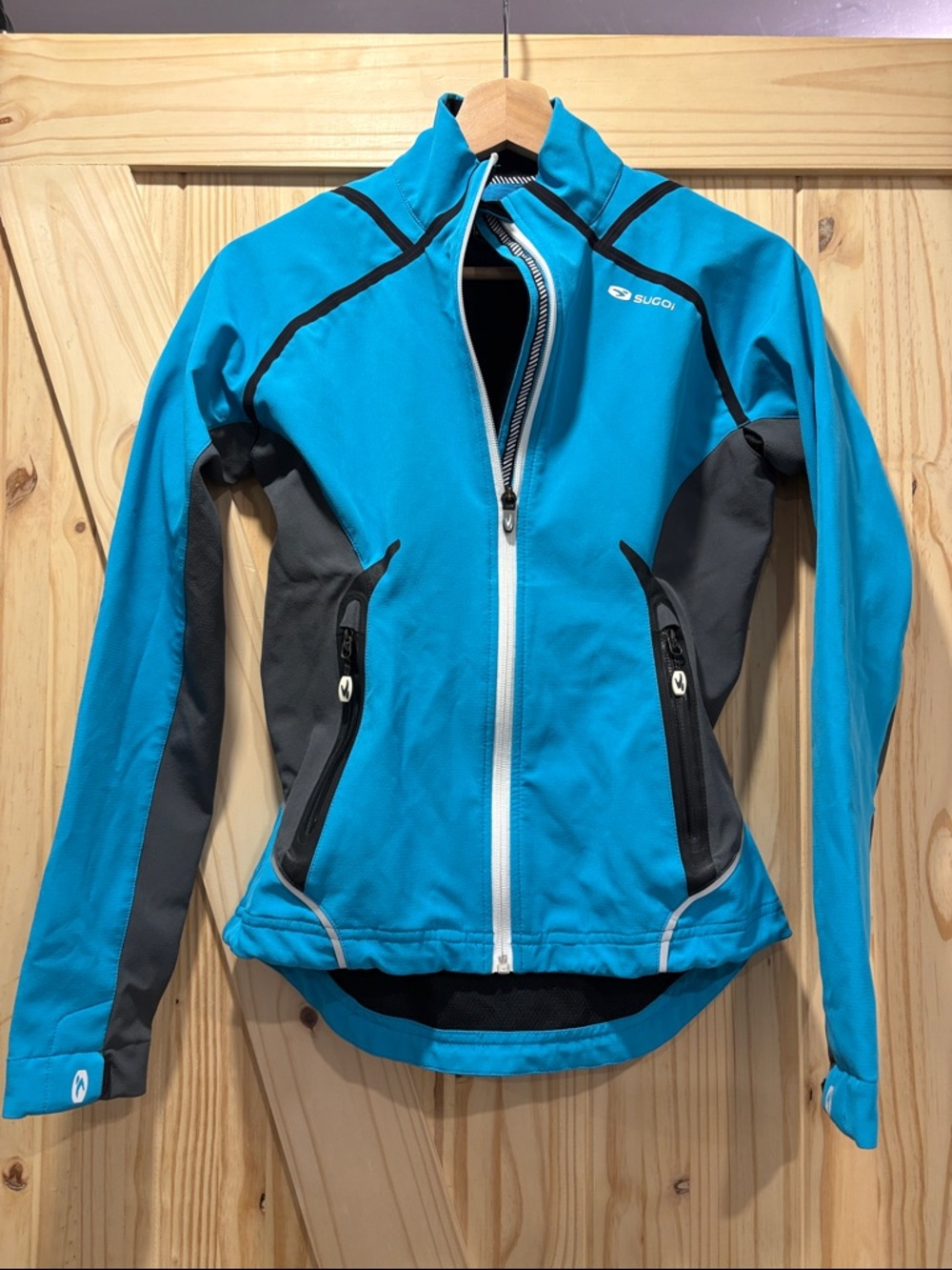 SUGOI Blue and Charcoal Running Jacket